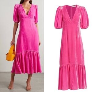 Constructed of a soft velvet, RHODE's puff-sleeve Ester midi-dress